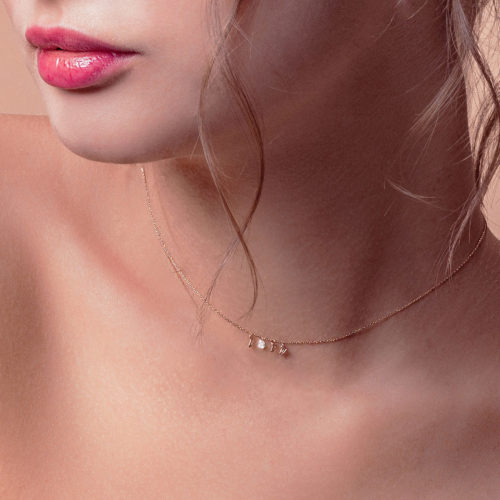 Model Wearing 18K Love Diamond Necklace